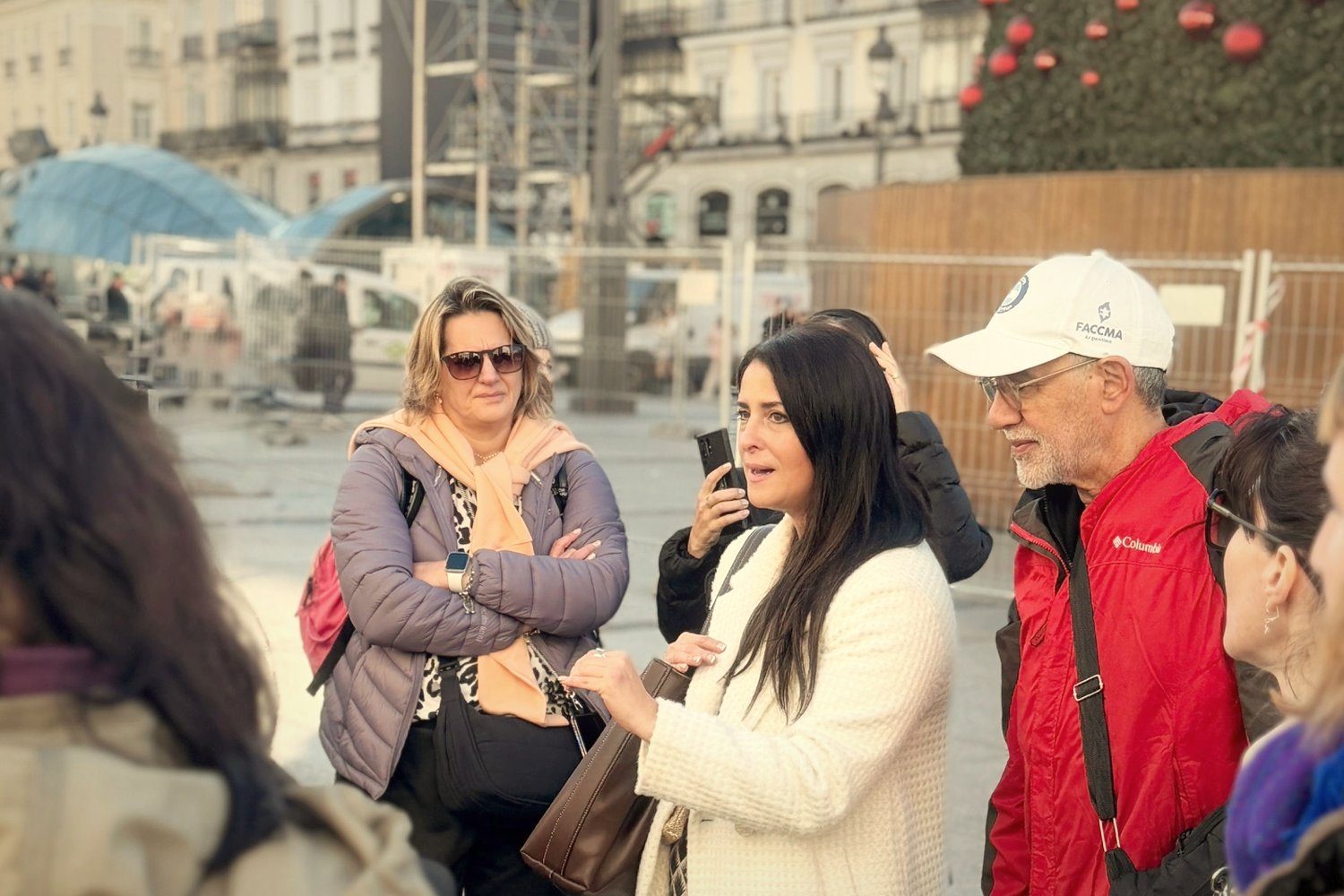 Alejandra guiding a group in Puerta del Sol
