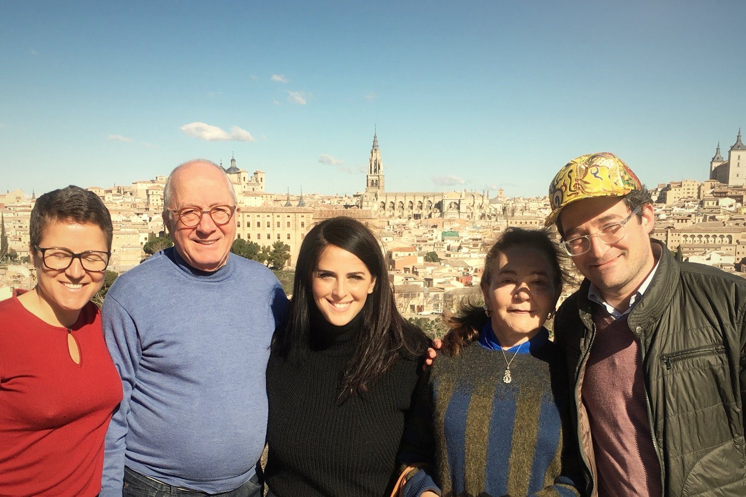 Alejandra with a family above Toledo