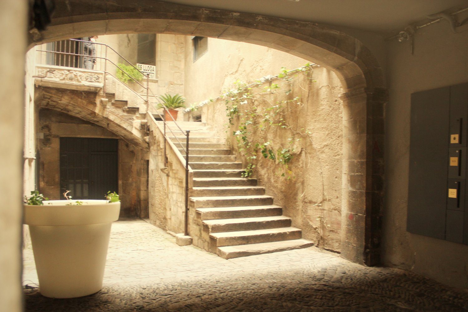 A stone archway and stairs in the medieval Jewish quarter of Girona