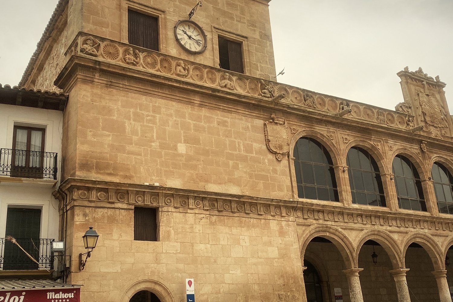 A Renaissance town hall with a clock tower in La Mancha