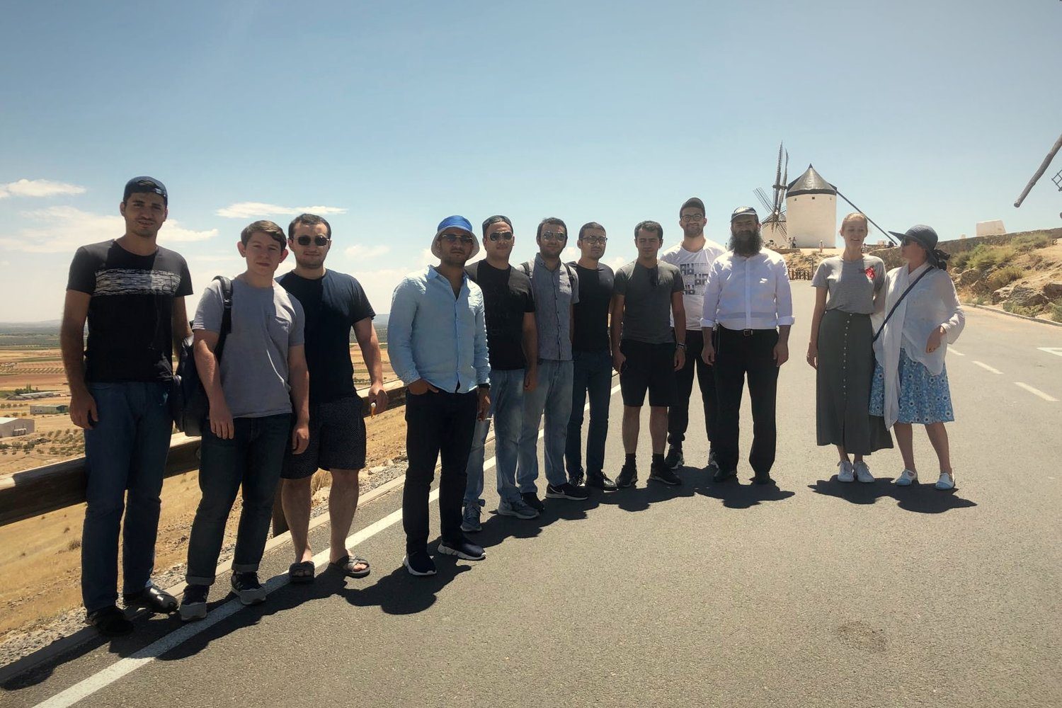 A young group with their rabbi by the windmills of Consuegra