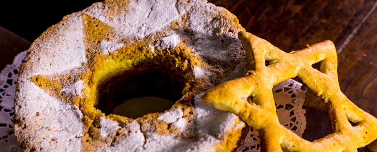 Sephardic pastries: a sugar-dusted ring cake and a star-shaped bread